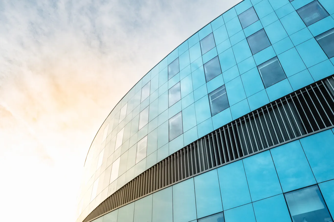 Contemporary commercial building symbolizing SPUR property insurance solutions, disciplined underwriting, and scalable capacity.